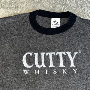 Charcoal Crewneck Cutty  Whisky t shirt with black trim.